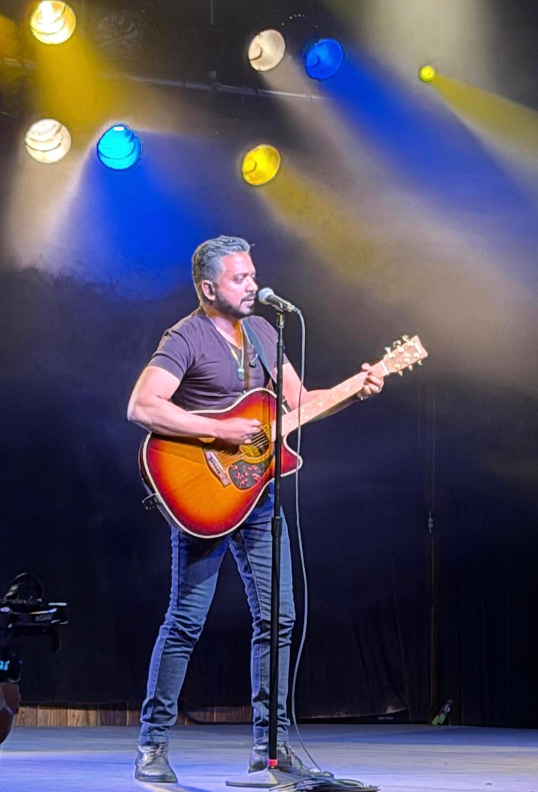 Laji George performing with soulful intensity
